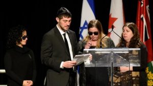 Lauth Investigations International | Canadian Pharma Billionaire Homicide Jonathon Sherman cries as he speaks during a memorial service for his parents, Barry and Honey Sherman, as his sisters look on Thursday, December 21, 2017. (Nathan Denette/The Canadian Press)